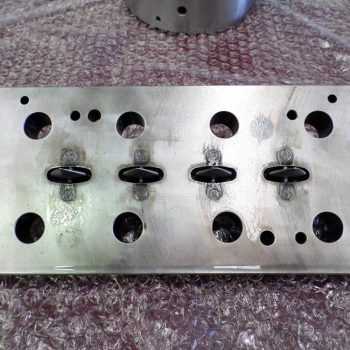 Limpieza por ultrasonidos de moldes de inyección